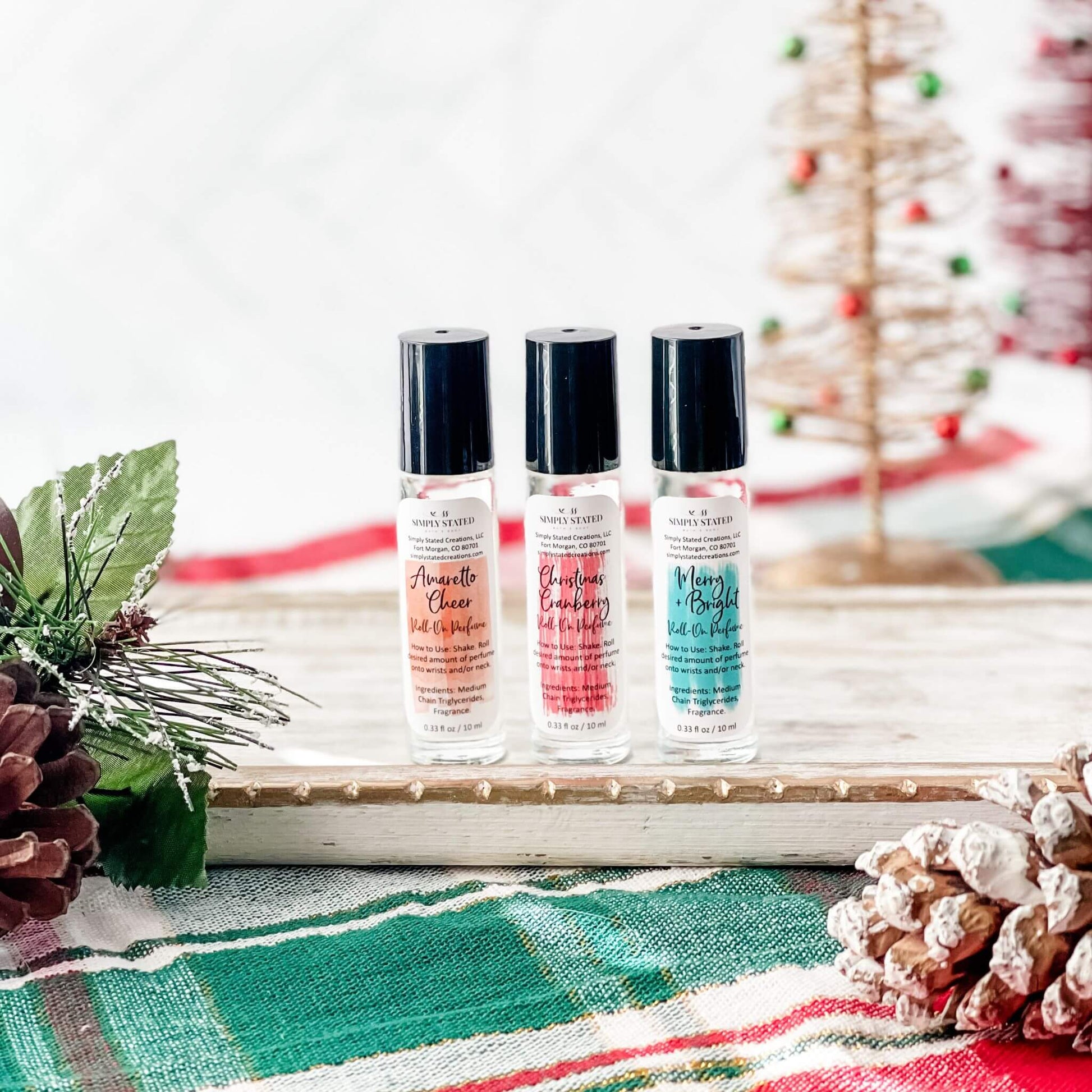 2023 Christmas Collection Roll-On Perfume in new limited edition scents like Amaretto Cheer, Christmas Cranberry, and Merry & Bright